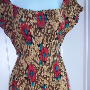 Long and flowy!  Beautiful with sandal or a heel.